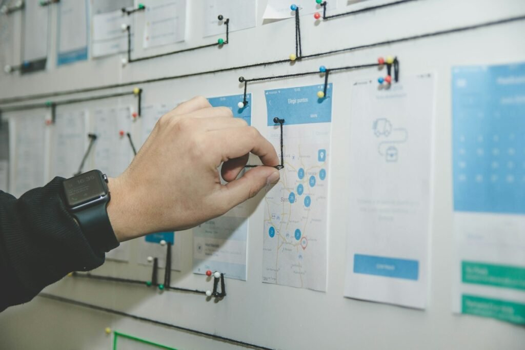 Designer mapping user journeys